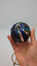 Load and play video in Gallery viewer, Hand blow glass ornament - Dichroic blue stripes and rainbow
